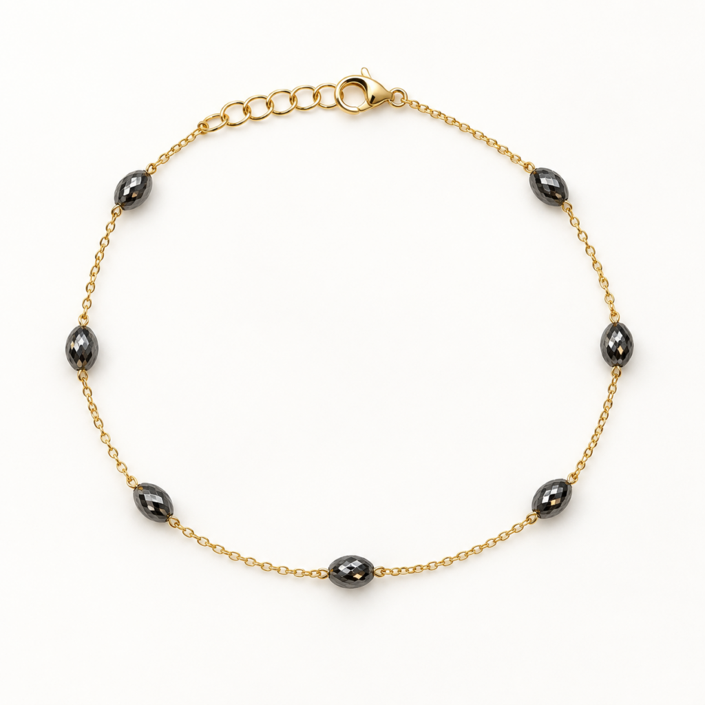 Bracciale in oro con elementi ovali rodiati neri